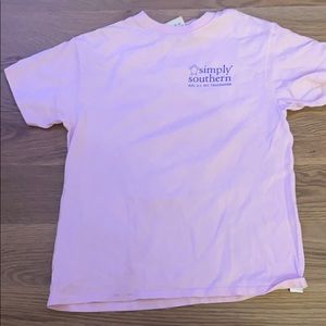 A pink shirt with a sea turtle on the back